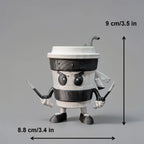 3D-printed Cappuccini Assassini Collector's Edition -  Animated character made from a coffee cup on a wooden surface with background kitchen items
