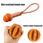 Dog Ball with Rope handle interactive toy with "leaking" treets to help clean teeth
