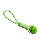 Dog Ball with Rope handle interactive toy with "leaking" treets to help clean teeth